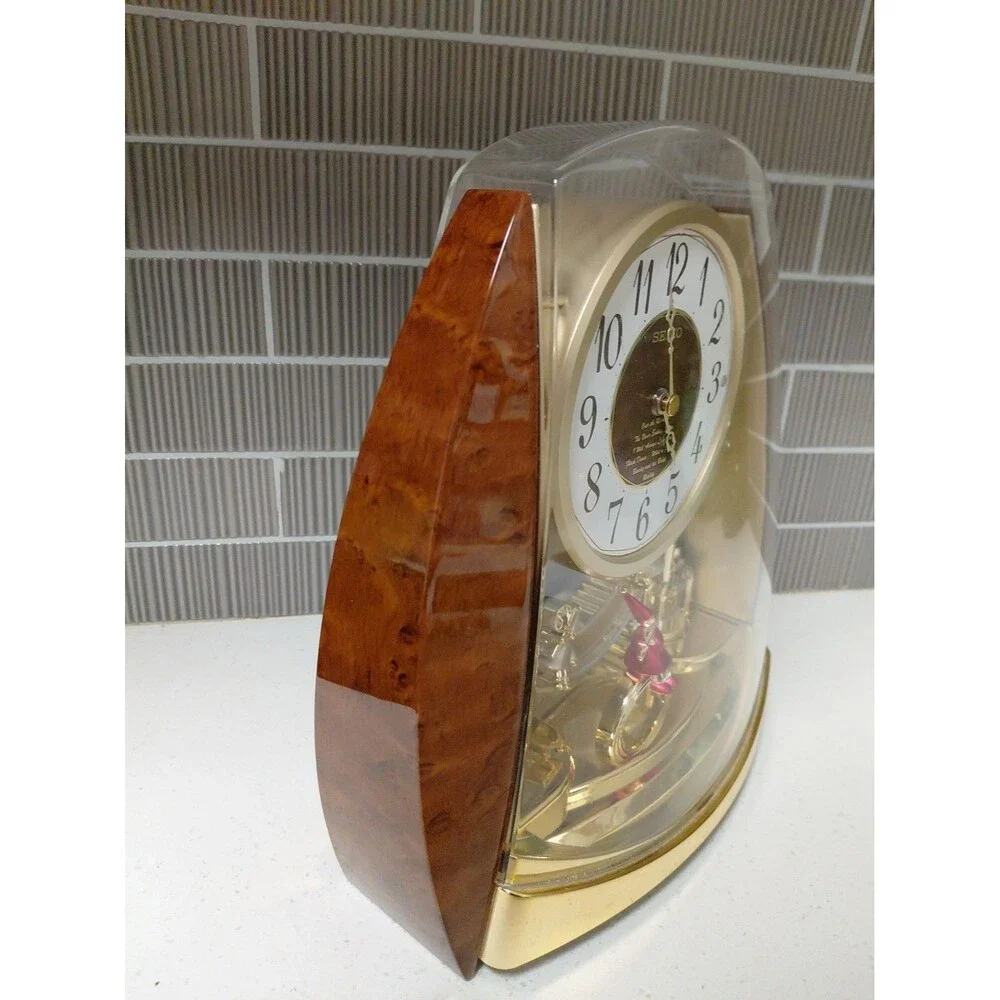 Seiko QXW115BRH Contemporary Fantasy Swing Musical Motion Decorative Clock